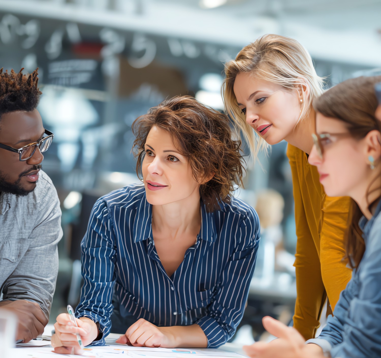 A multicultural team of professionals working together around a table